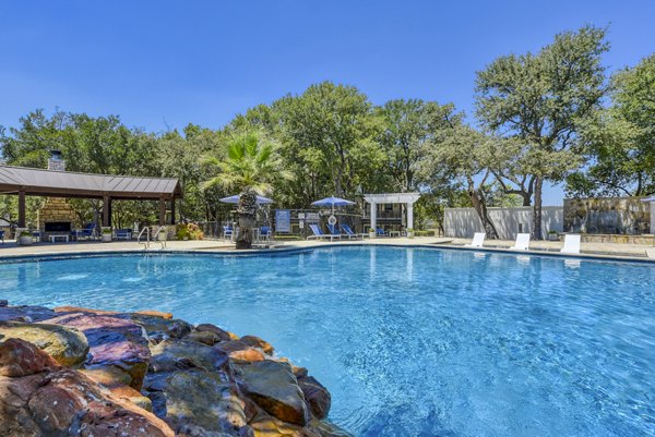 Modern pool at Judson Pointe Apartments offering relaxing views and luxury amenities for residents