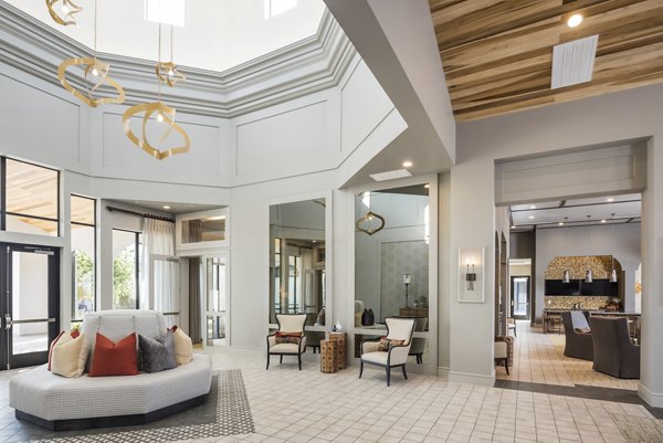 Stella at Riverstone: Luxury apartment complex with modern architecture nestled in serene landscaping
