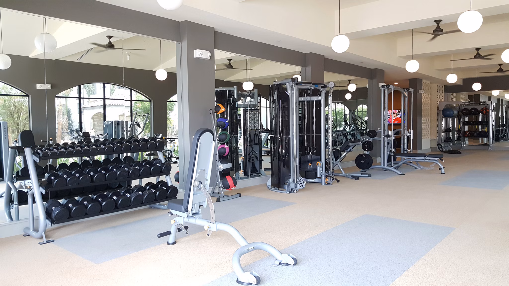 fitness center at Stella at Riverstone Apartments