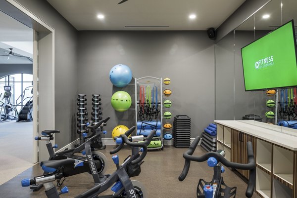 Fitness center with modern equipment at Stella at Riverstone Apartments, offering state-of-the-art amenities for residents to stay active and healthy