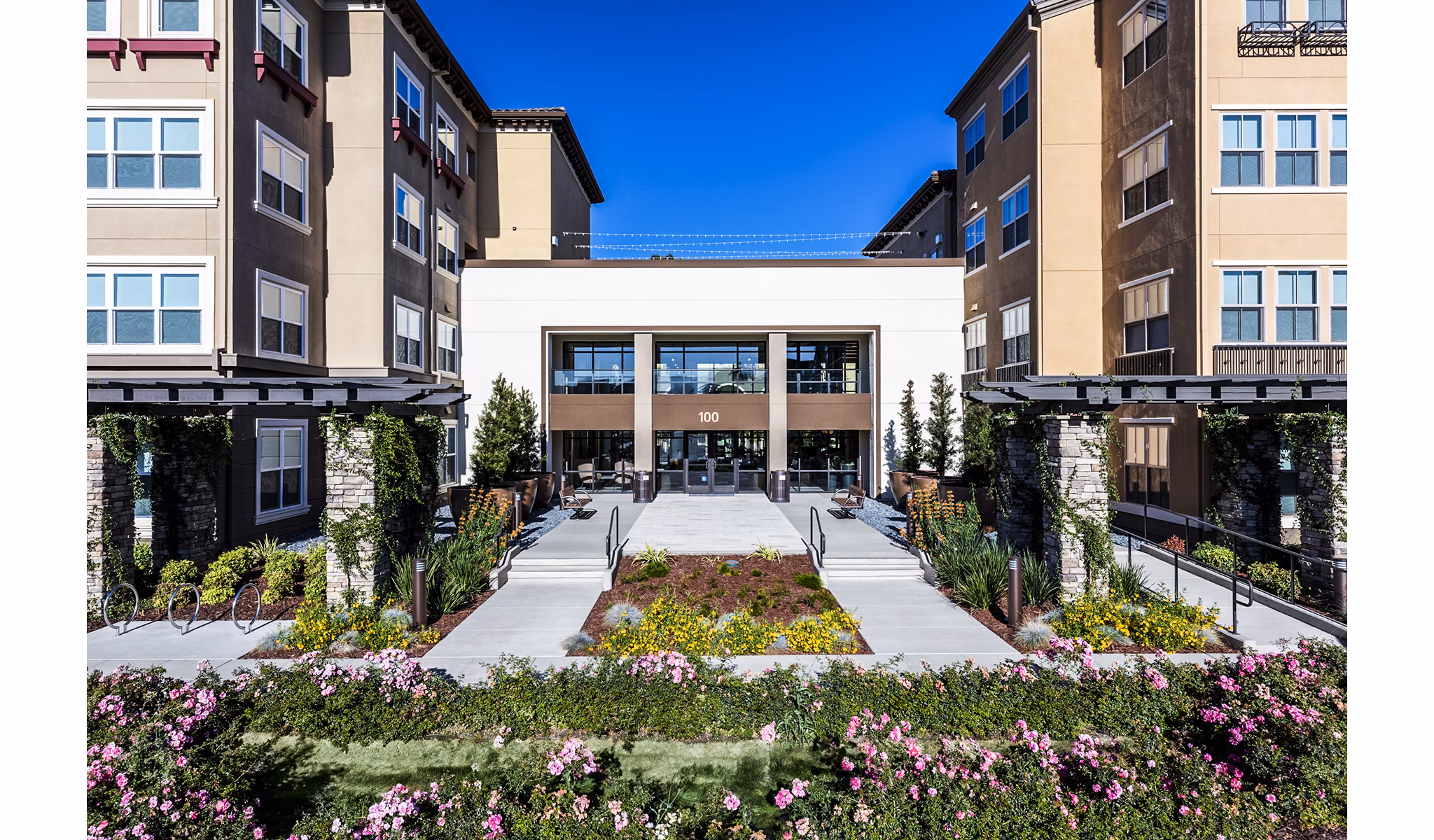 Revela Apartments: Modern luxury of high-rise building in vibrant urban setting