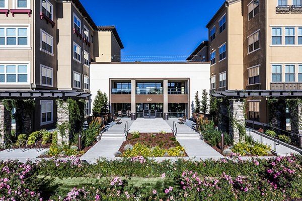 Revela Apartments: Modern luxury of high-rise building in vibrant urban setting