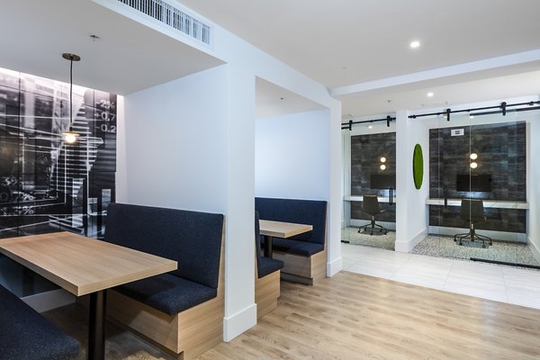 Modern meeting facility at Revela Apartments featuring state-of-the-art business center