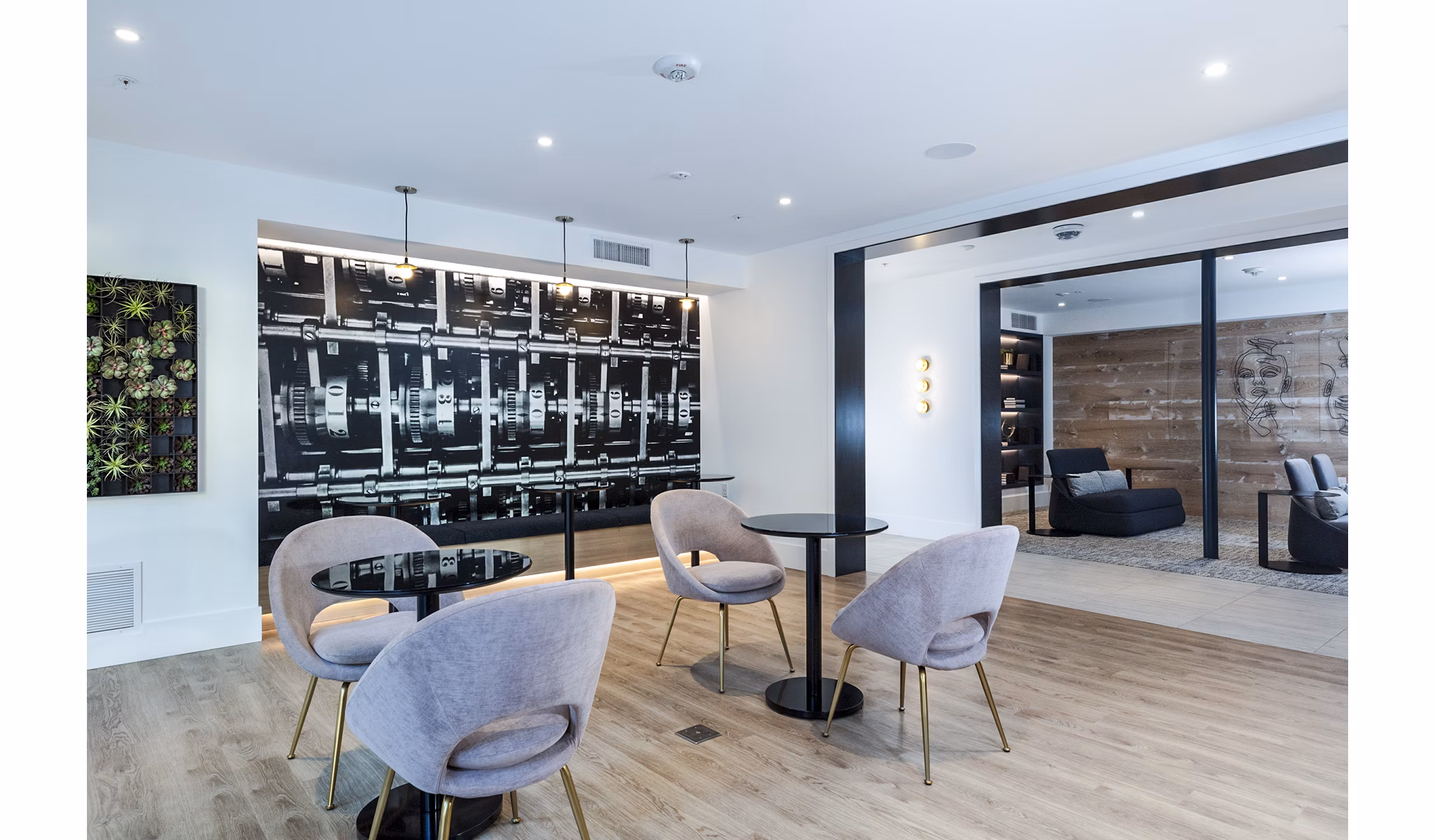 Modern clubhouse and meeting facility at Revela Apartments offering flexible spaces for social and business gatherings