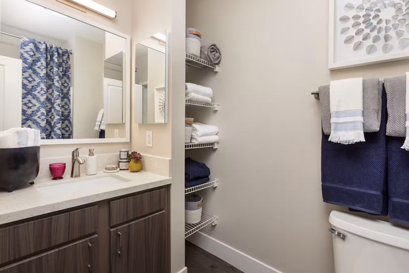 Contemporary bathroom with modern fixtures at Entrada Apartments