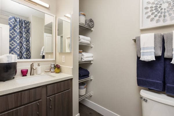 Contemporary bathroom with modern fixtures at Entrada Apartments