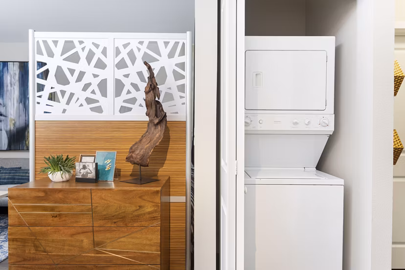 Modern laundry room with state-of-the-art appliances at Entrada Apartments, ensuring convenience and efficiency for residents