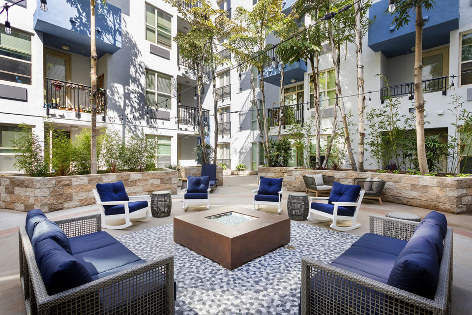 Cozy fire pit at Entrada Apartments offering a perfect spot for gathering and relaxation