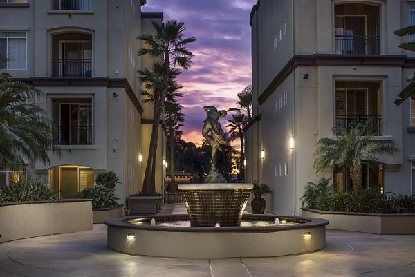 Regents La Jolla: Contemporary apartment building featuring lush landscaping in a luxury community