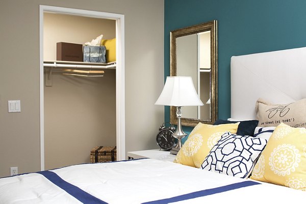 Cozy bedroom with elegant decor in Regents La Jolla Apartments, featuring luxury accents and comfortable bedding