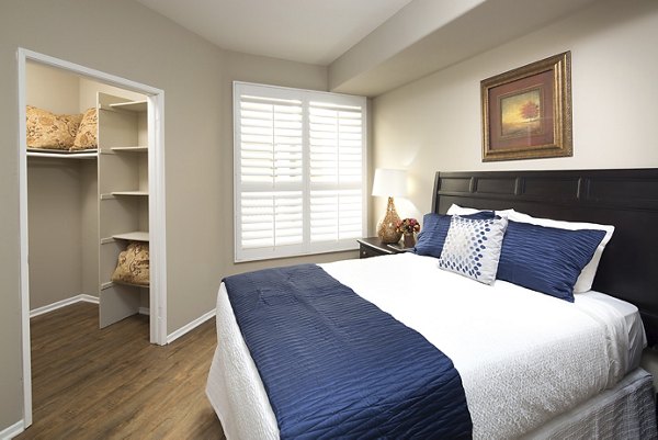 Spacious bedroom with modern design elements at Regents La Jolla Apartments, offering luxury living in San Diego