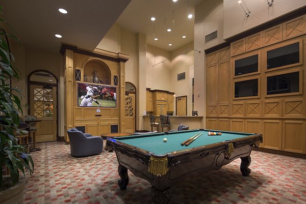 Vibrant game room featuring pool table and lounge seating at Regents La Jolla luxury apartments