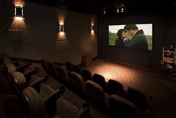 Theater room with plush seating at Regents La Jolla Apartments, a luxury property in La Jolla, featuring state-of-the-art entertainment options
