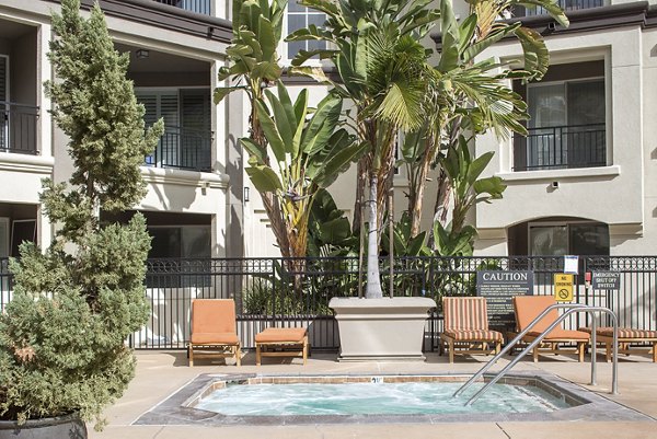 Relaxing outdoor hot tub at Regents La Jolla Apartments, perfect for unwinding in luxury living surroundings