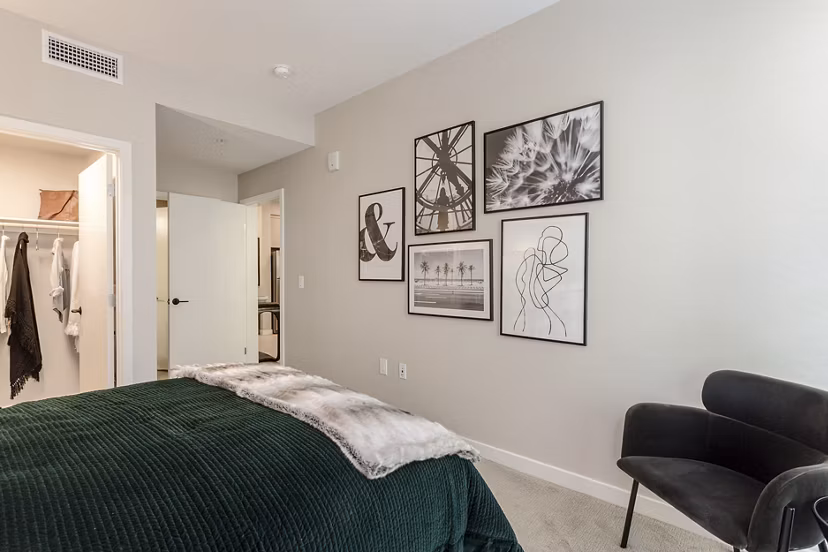 Elegant bedroom with stylish decor at THEO luxury apartments, perfect for relaxation and comfort