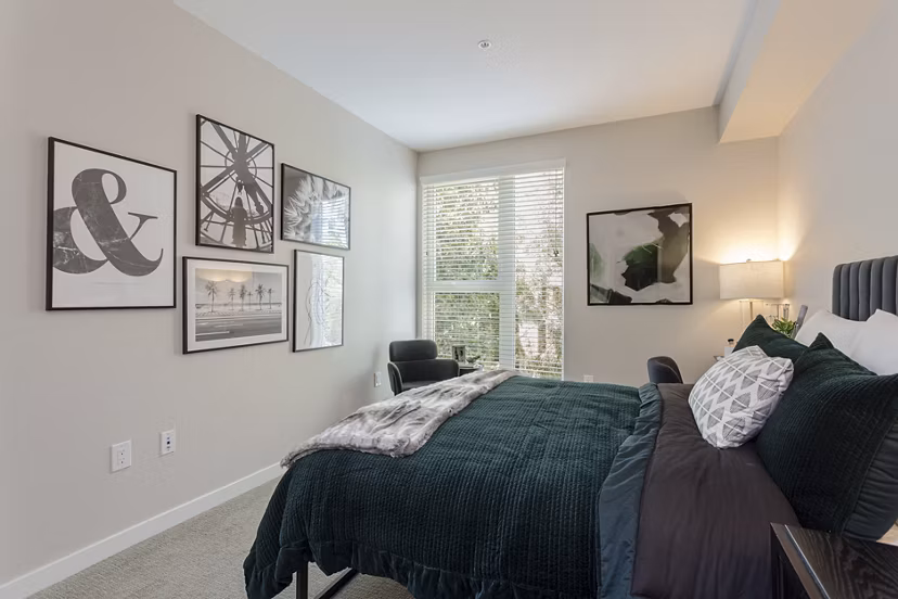 Bedroom featuring serene decor and plush bedding in THEO luxury apartments