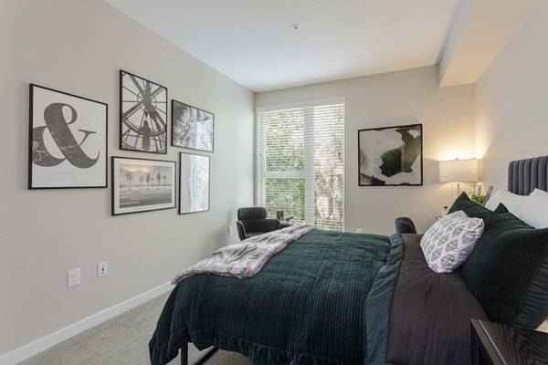 Bedroom featuring serene decor and plush bedding in THEO luxury apartments