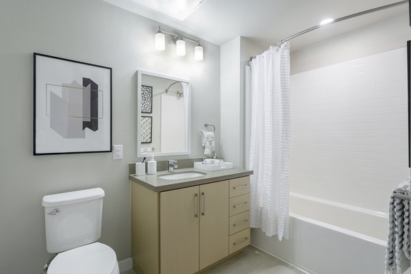 Modern bathroom with sleek fixtures at THEO luxury apartments