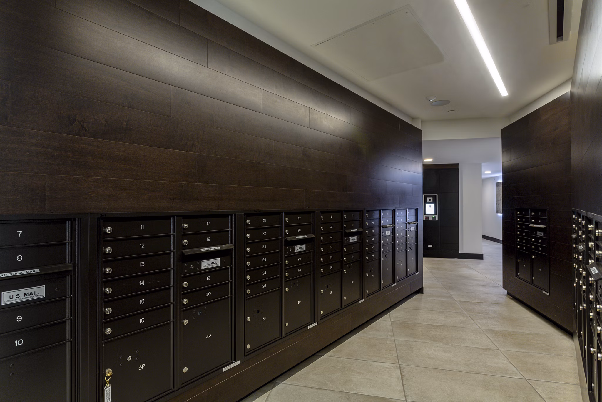 Efficient mail room facilities at THEO luxury apartments, providing secure parcel delivery and pick-up services for residents