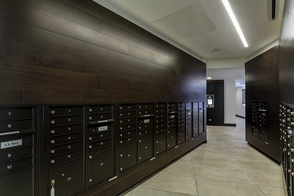 Efficient mail room facilities at THEO luxury apartments, providing secure parcel delivery and pick-up services for residents