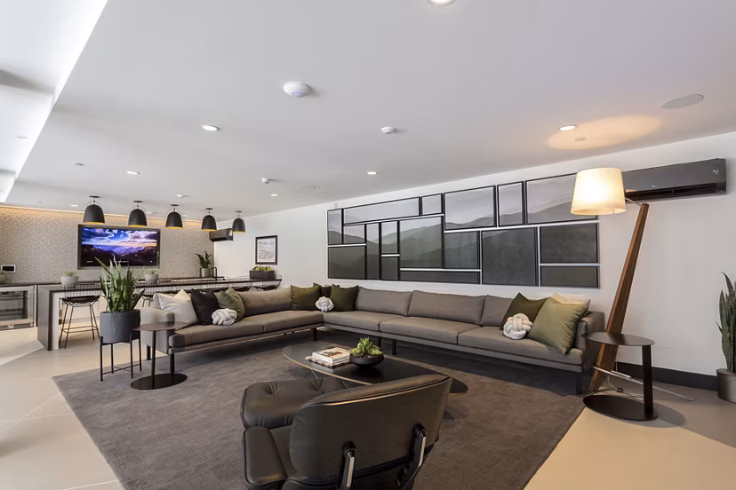 Clubhouse featuring modern design and comfortable seating at THEO luxury apartments