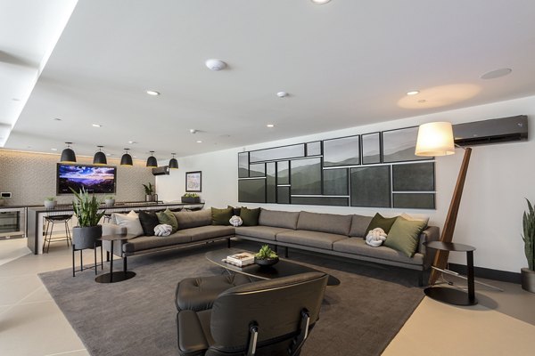 Clubhouse featuring modern design and comfortable seating at THEO luxury apartments