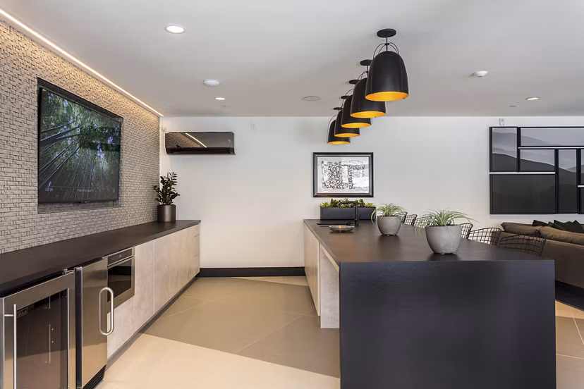 Clubhouse at THEO: Elegant space with comfortable seating and modern decor for residents of luxury apartments
