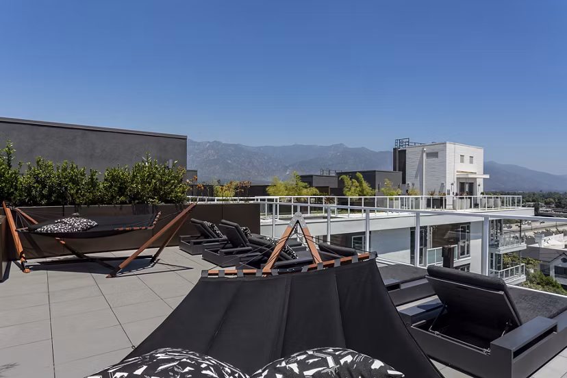 Spacious patio with outdoor seating at THEO luxury apartments