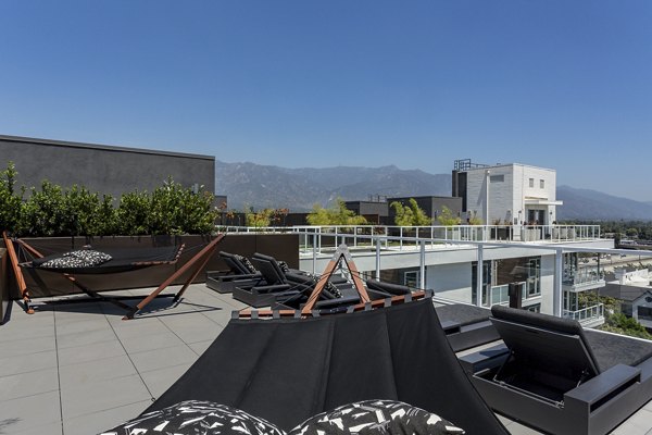 Spacious patio with outdoor seating at THEO luxury apartments