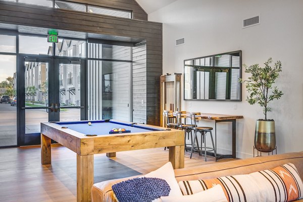 clubhouse game room at Hawthorne Townhomes Apartments