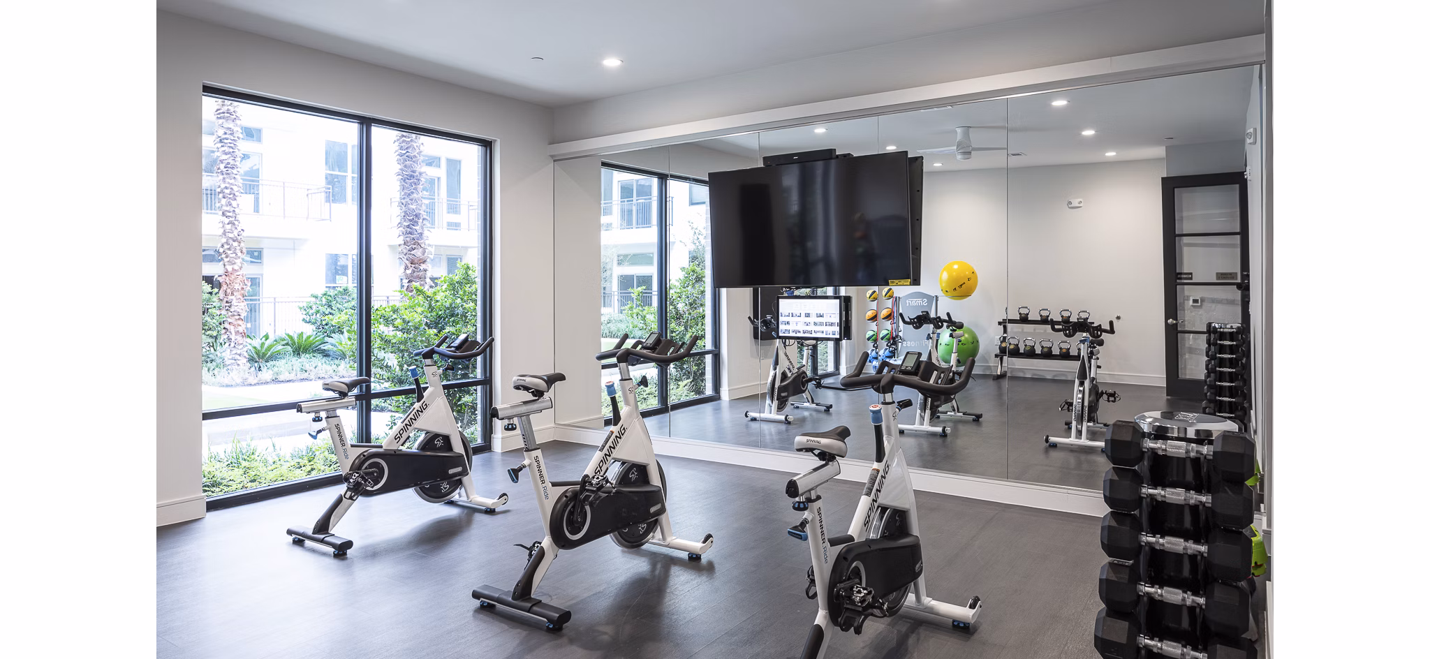fitness center at Bellrock Summer Street Apartments