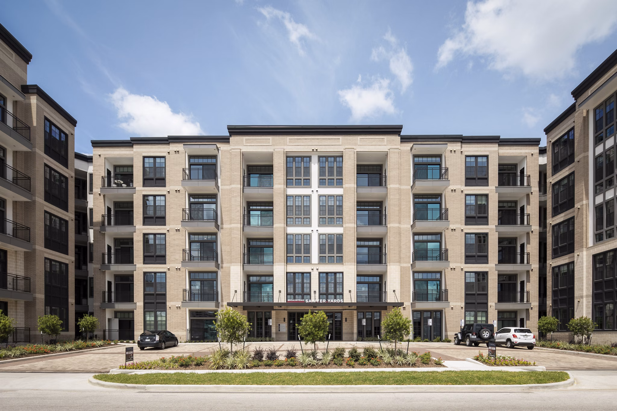 Broadstone Sawyer Yards: Contemporary luxury apartments in Houston, showcasing sleek design and vibrant community atmosphere