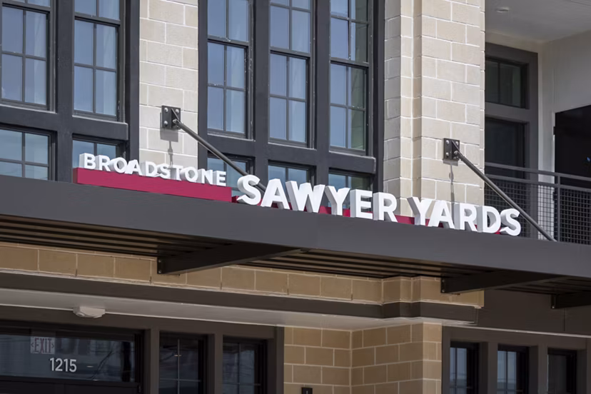 Broadstone Sawyer Yards: Modern signage at luxury apartments in Houston