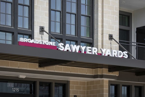 Broadstone Sawyer Yards: Modern signage at luxury apartments in Houston