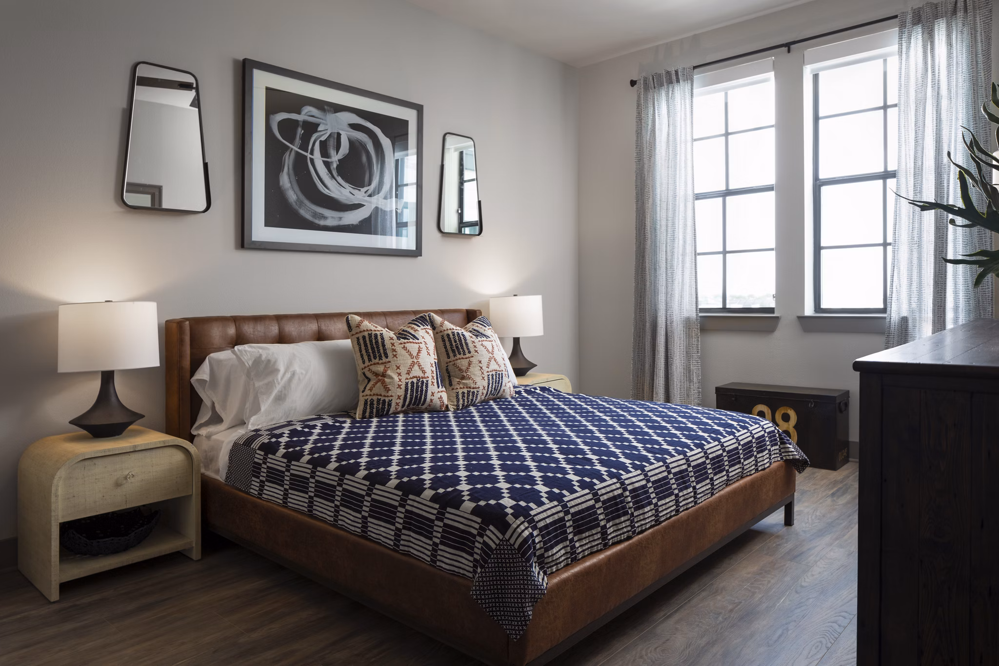 Spacious bedroom with modern decor at Broadstone Sawyer Yards Apartments in Houston