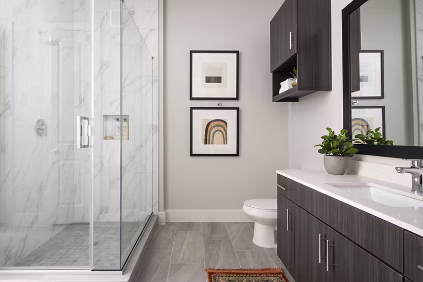 Modern bathroom with stylish fixtures in Broadstone Sawyer Yards Apartments, offering comfort and luxury living experience