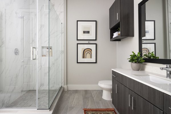 Modern bathroom with stylish fixtures in Broadstone Sawyer Yards Apartments, offering comfort and luxury living experience