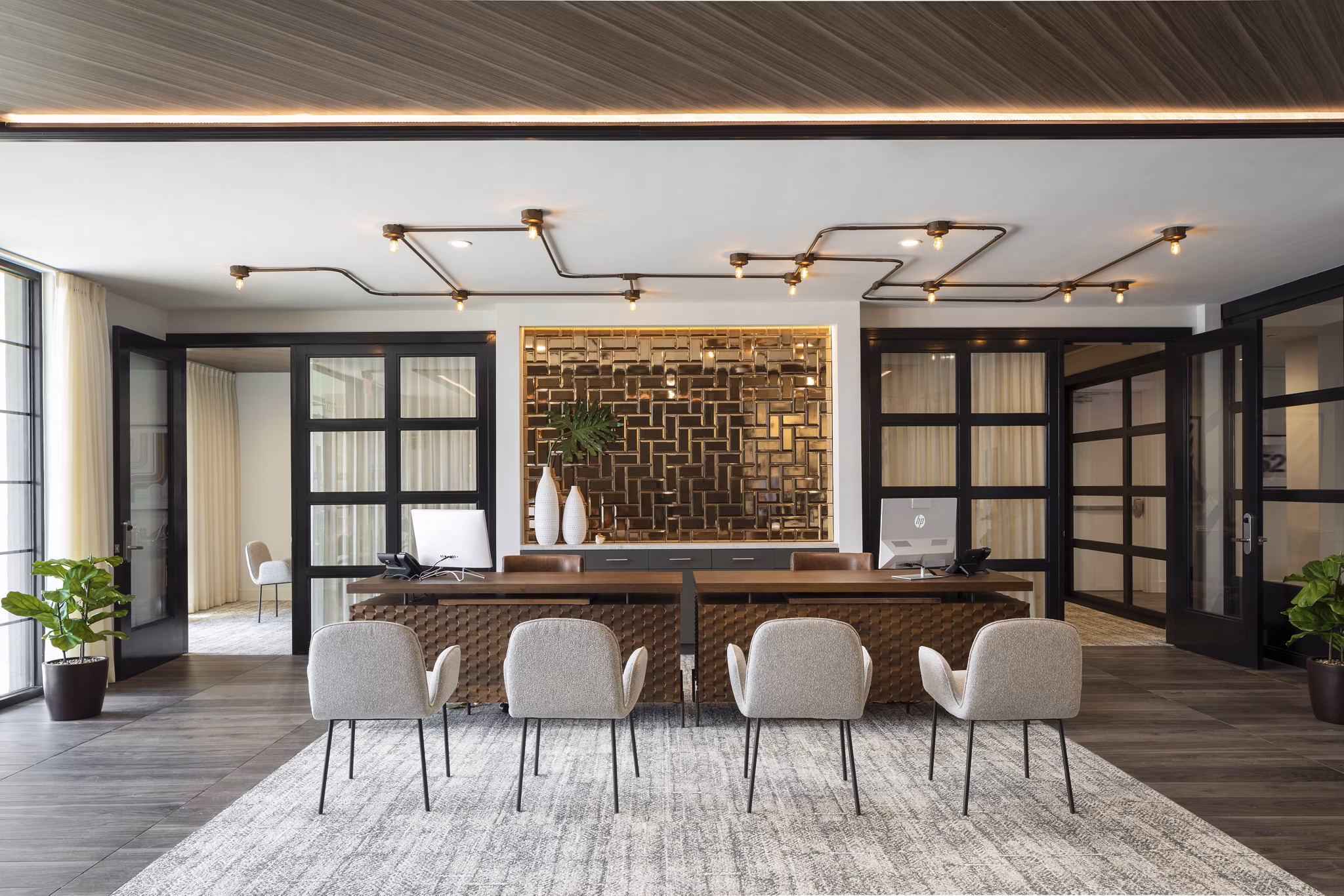 Clubhouse with modern decor at Broadstone Sawyer Yards Apartments, perfect for social gatherings and community events