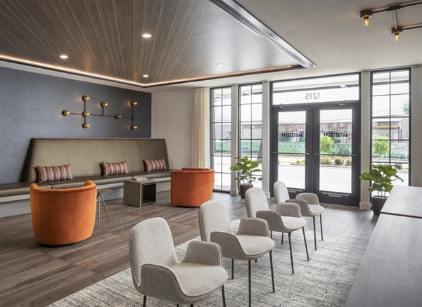 Clubhouse with modern design and ample seating at Broadstone Sawyer Yards Apartments