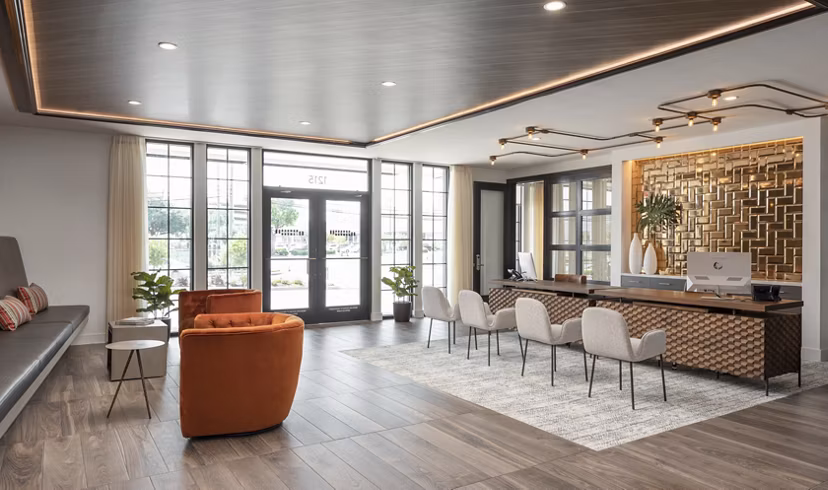 Stylish clubhouse with modern decor at Broadstone Sawyer Yards Apartments, perfect for social gatherings and community events