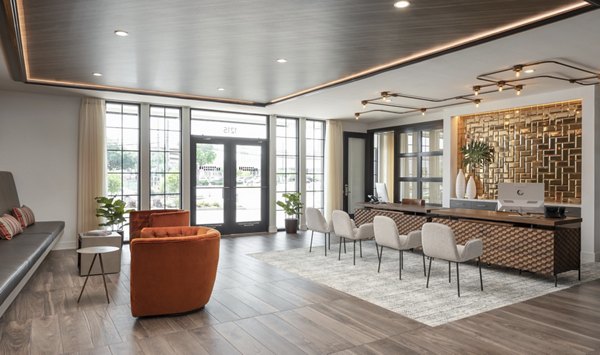 Stylish clubhouse with modern decor at Broadstone Sawyer Yards Apartments, perfect for social gatherings and community events