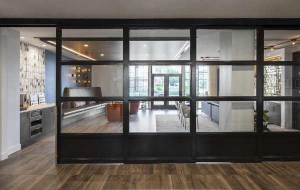 Clubhouse featuring modern design and comfortable seating at Broadstone Sawyer Yards Apartments