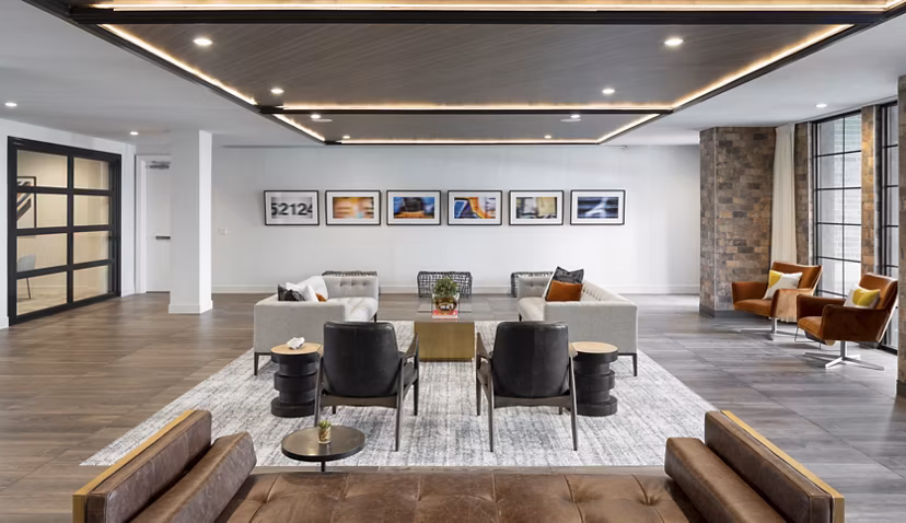 Clubhouse featuring modern design and vibrant art at Broadstone Sawyer Yards Apartments