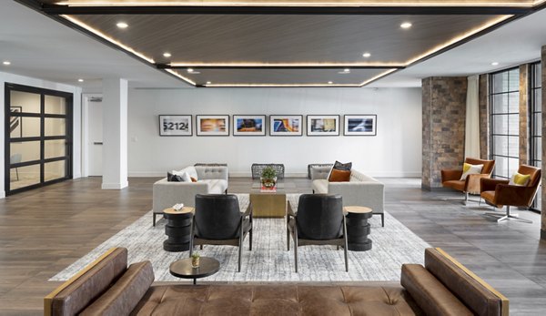 Clubhouse featuring modern design and vibrant art at Broadstone Sawyer Yards Apartments