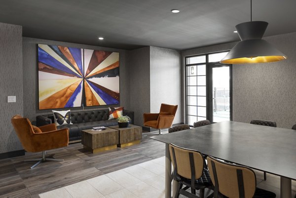 Clubhouse featuring modern design and ample seating at Broadstone Sawyer Yards Apartments Perfect for social gatherings and events
