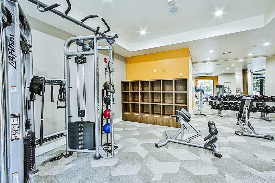 State-of-the-art fitness center with modern equipment at Broadstone Toscano Apartments, ideal for active lifestyles in luxury living