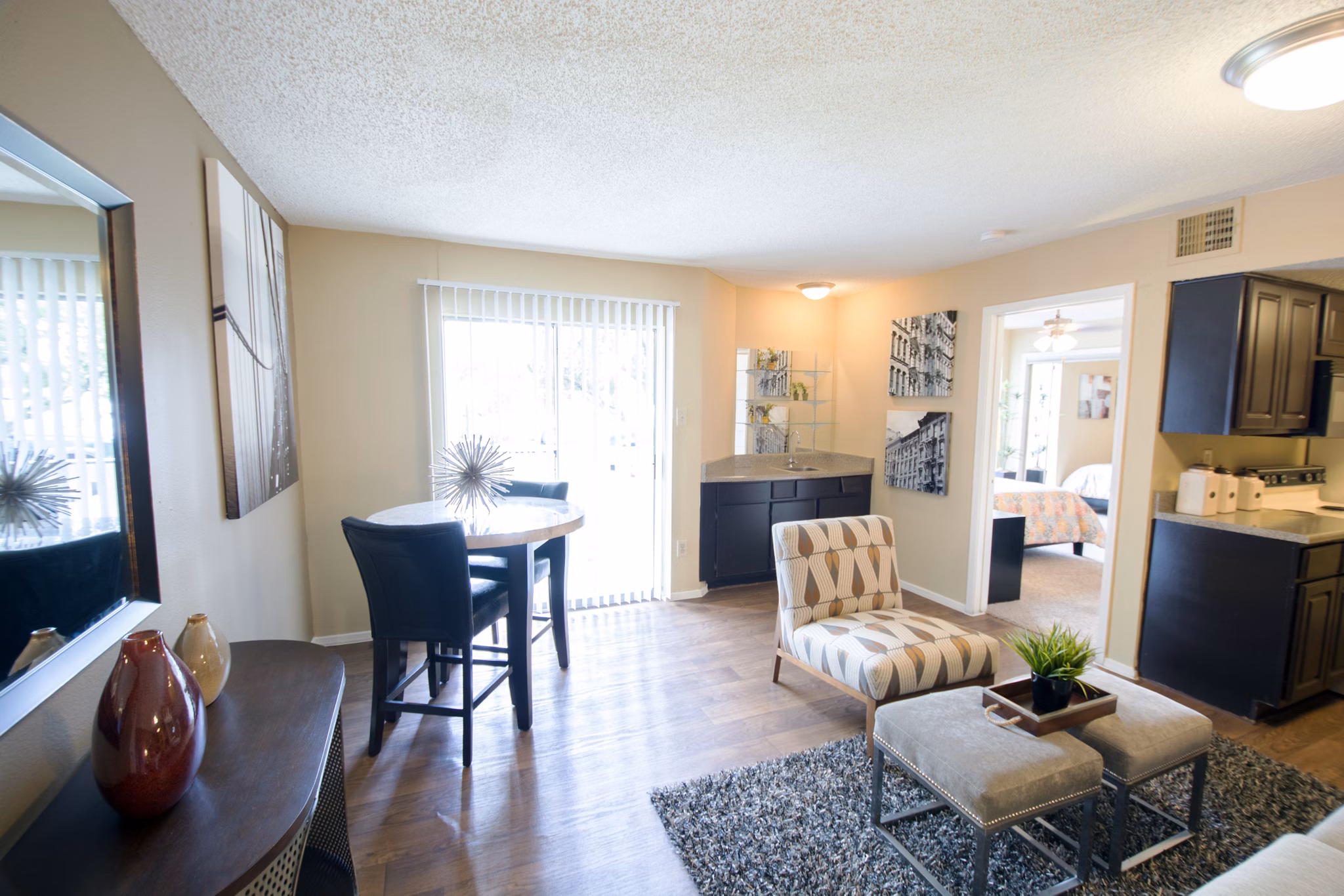 Spacious living room with modern decor at Oaks at Greenview Apartments, offering luxury living and comfort
