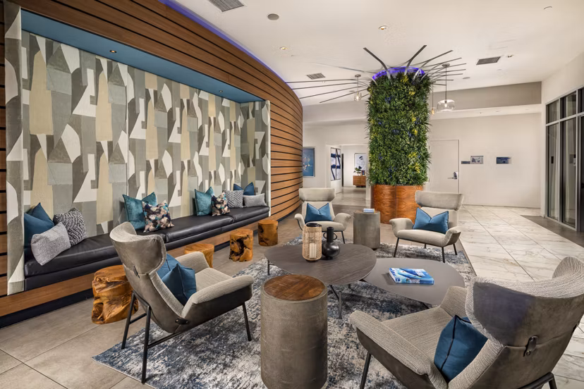 Modern lobby with sleek furnishings at The Current Apartments, a luxury Greystar property in a prime urban location