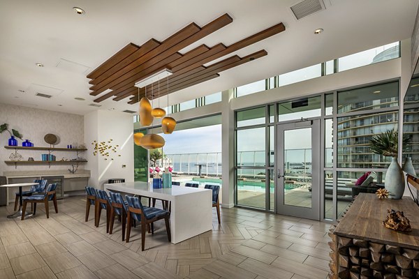 Lobby featuring contemporary design and seating area at The Current Apartments