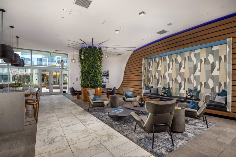 Clubhouse with modern decor at The Current Apartments featuring luxury amenities